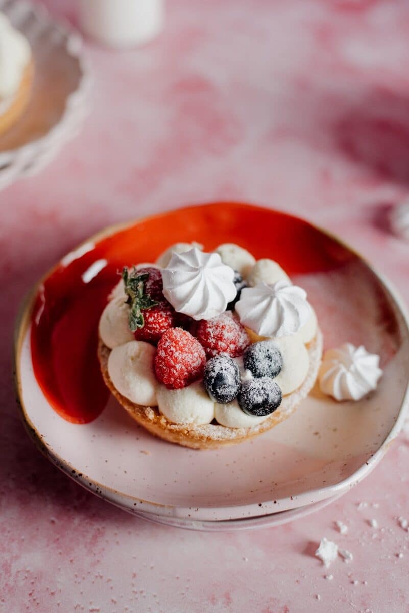a plate with a dessert on it on a table