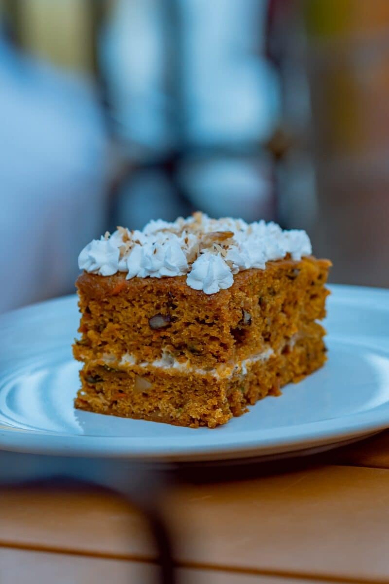 a piece of cake sitting on top of a white plate